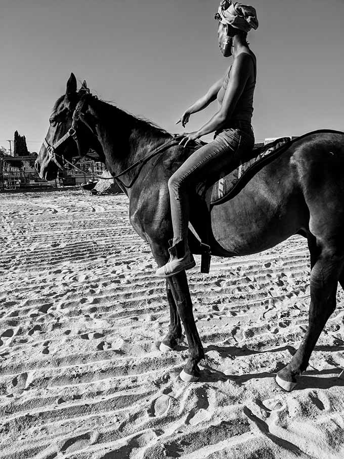 woman riding a horse