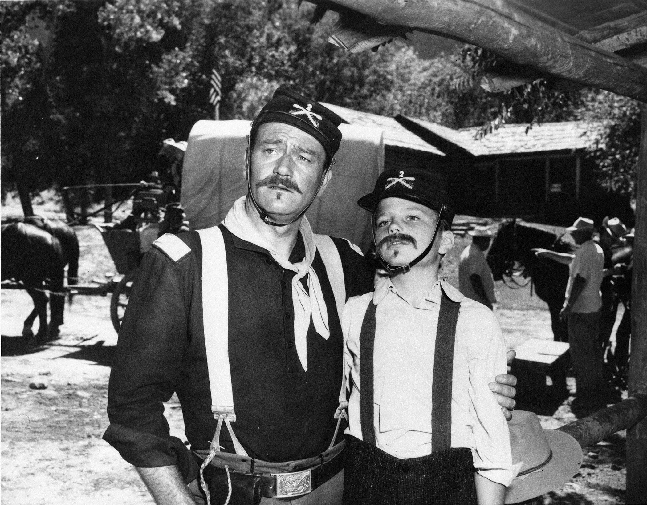 Patrick with his dad on set of the western film Rio Grande (1950).