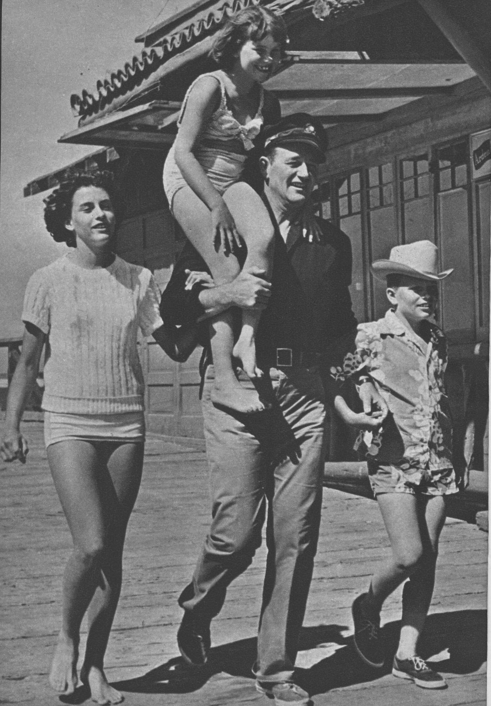 Some of Duke’s most adoring fans: Toni, Melinda and Patrick (from left to right) on Catalina Island during the filming of Operation Pacific.