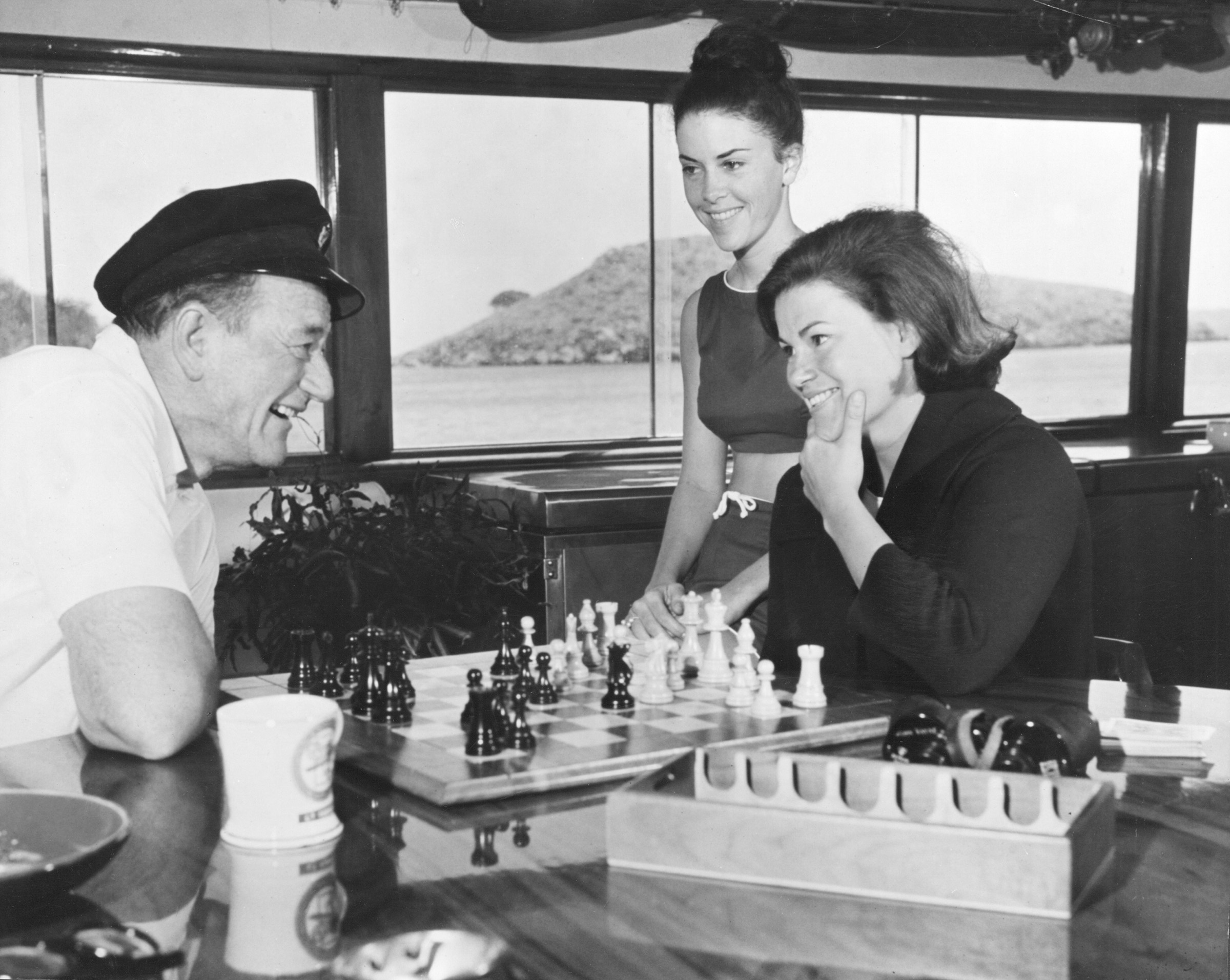 John Wayne, Peggy Wayne, and Melinda Wayne aboard the Wild Goose in 1963. Photo courtesy of John Wayne Enterprises