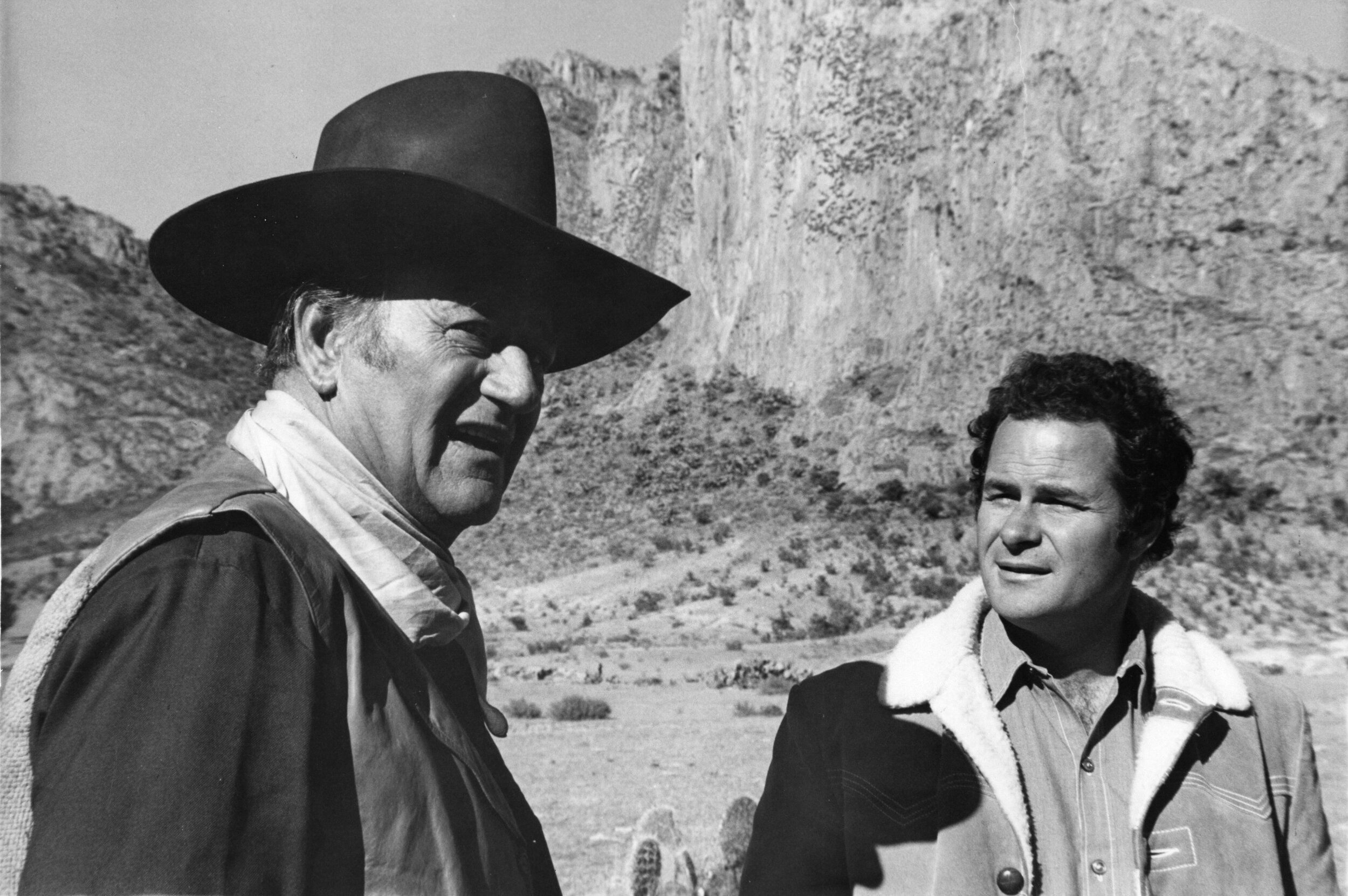 John Wayne and Michael on the set of 1973 Western film Cahil U.S. Marshal, produced by Batjac Productions.