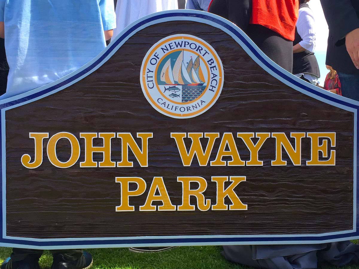 The new sign for John Wayne Park, dedicated in John Wayne’s honor on what would have been his 110th birthday on May 26th, 2017. Photo courtesy of John Wayne Enterprises