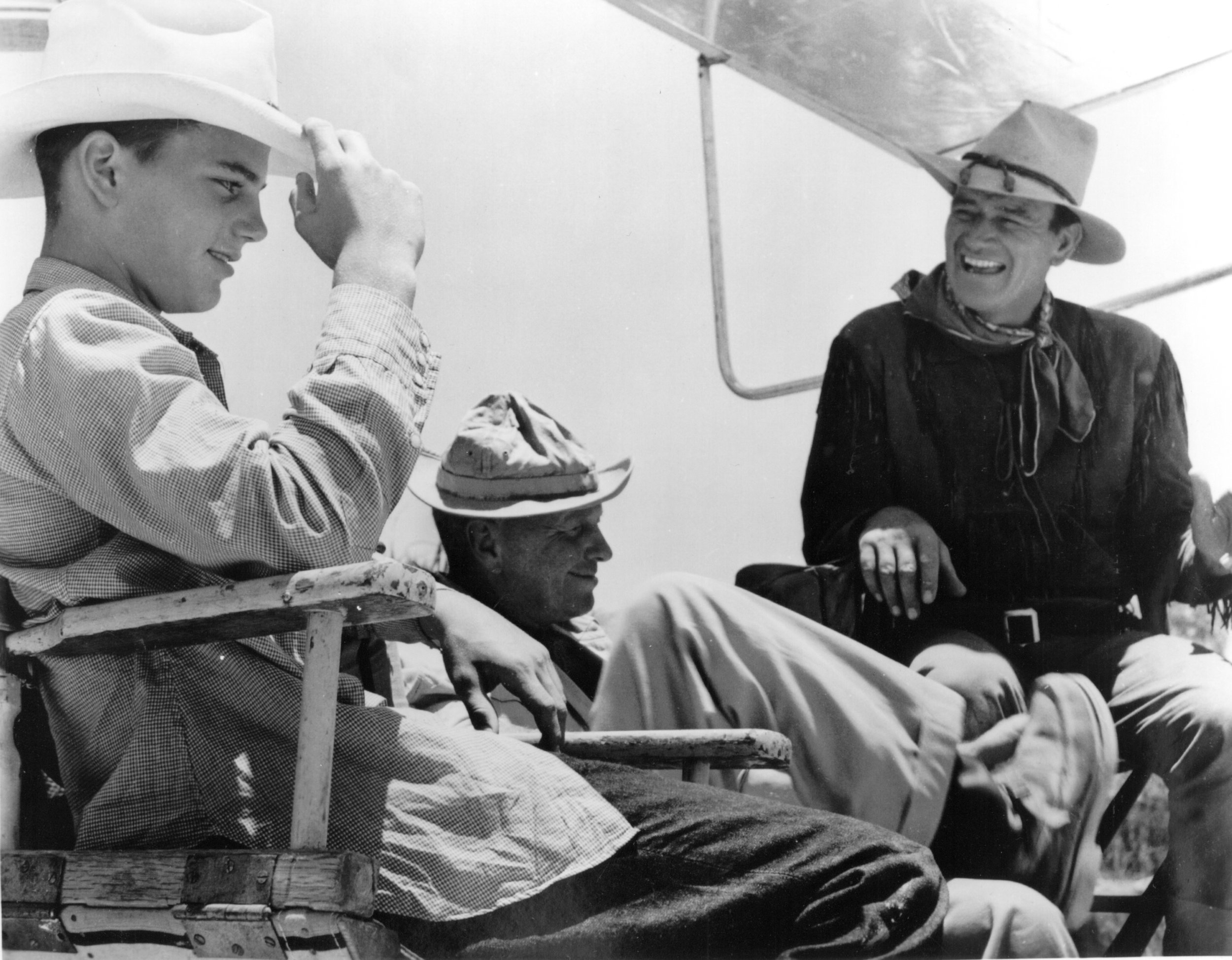 Patrick Wayne (left) on the set of Hondo with his father John Wayne (right), c. 1953.