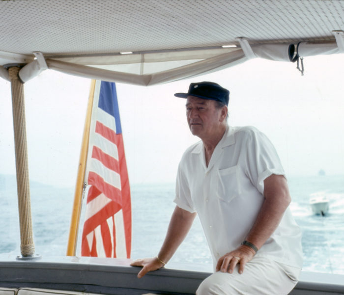 John Wayne aboard his boat the Wild Goose in the 1960s. Photo courtesy of John Wayne Enterprises