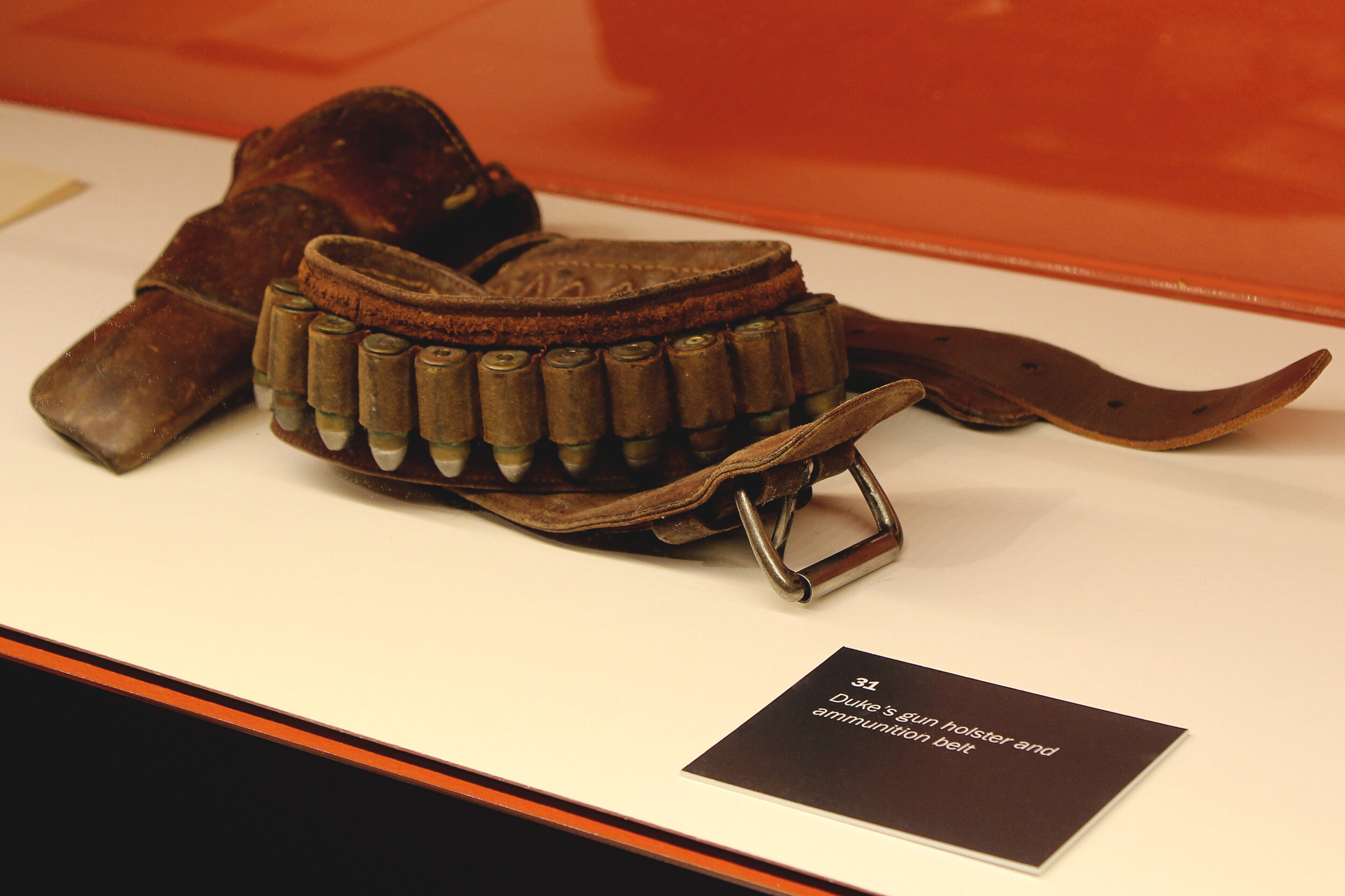 John Wayne’s gun holster and ammunition belt on display at an exhibit in Nashville, Tennessee. Photo courtesy of JWE