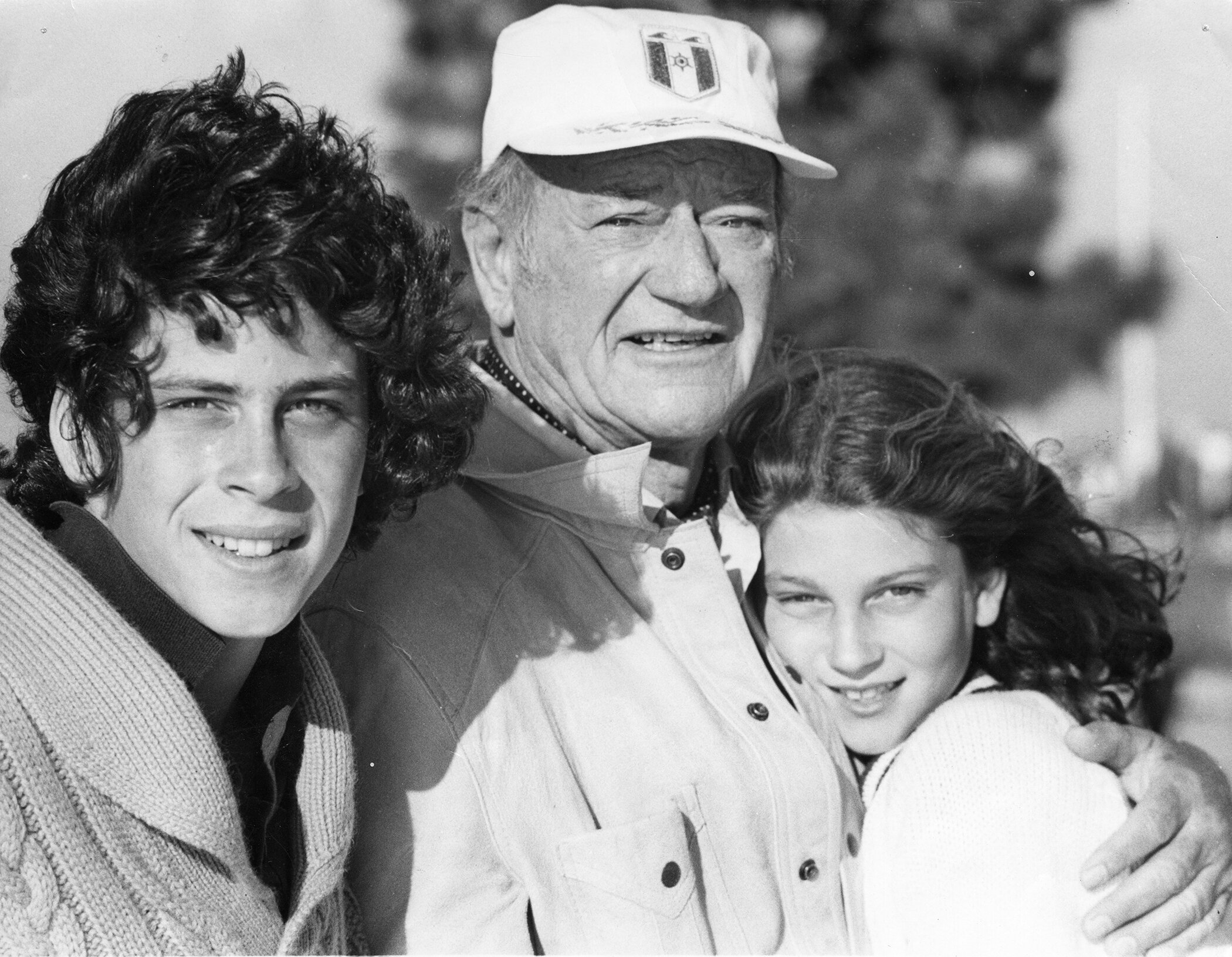 John Wayne with Ethan and Marisa aboard the Wild Goose.