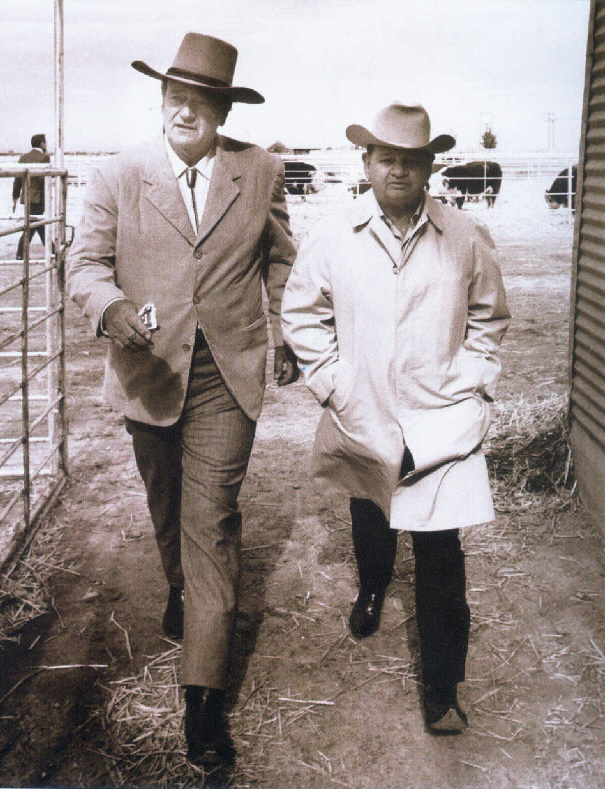 John Wayne and Louis Johnson at 26 Bar Ranch in Arizona.